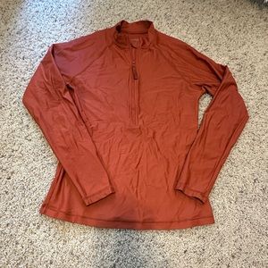 J Crew long sleeved rash guard, rust